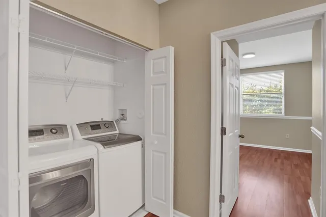 a utility room with dryer and washer