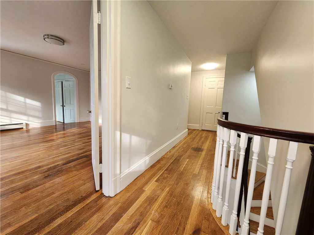 599 Harris Avenue Woonsocket, RI 02895 - Photo 16 of 48 Hallway into primary bedroom