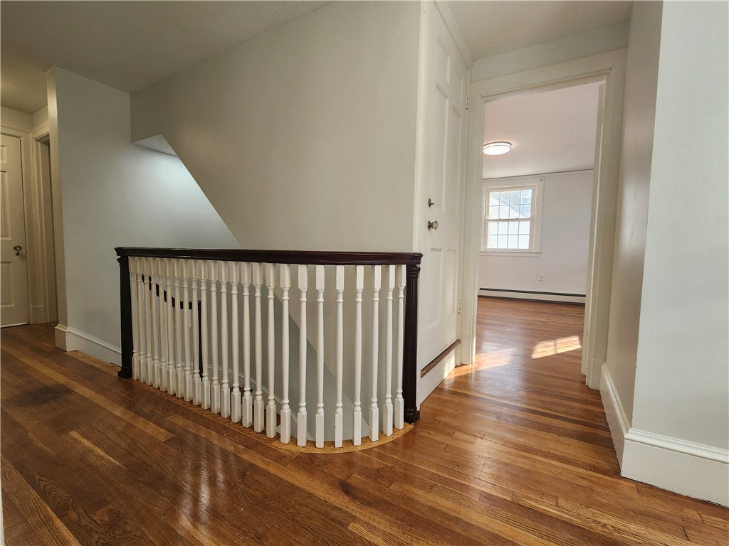 599 Harris Avenue Woonsocket, RI 02895 - Photo 23 of 48 Elegan handrail. Straight ahead is Bedroom 2. Door to left is family bath