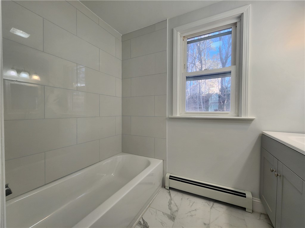599 Harris Avenue Woonsocket, RI 02895 - Photo 25 of 48 Family bath. Tiled shower