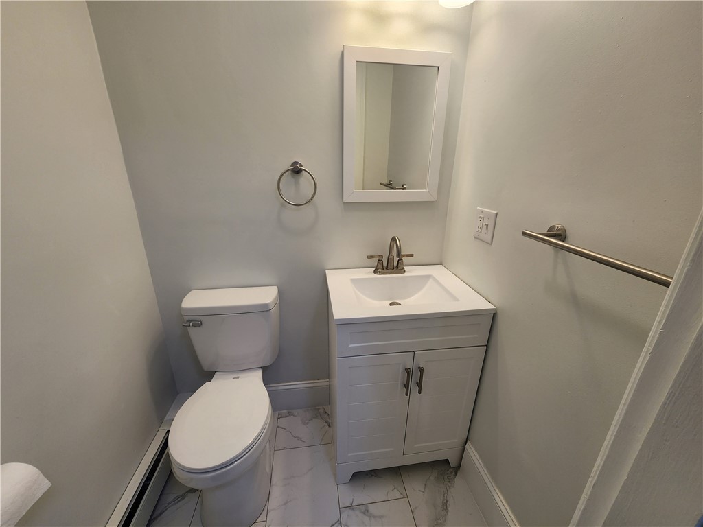 599 Harris Avenue Woonsocket, RI 02895 - Photo 10 of 48 1st fl half bath - all new fixtures
