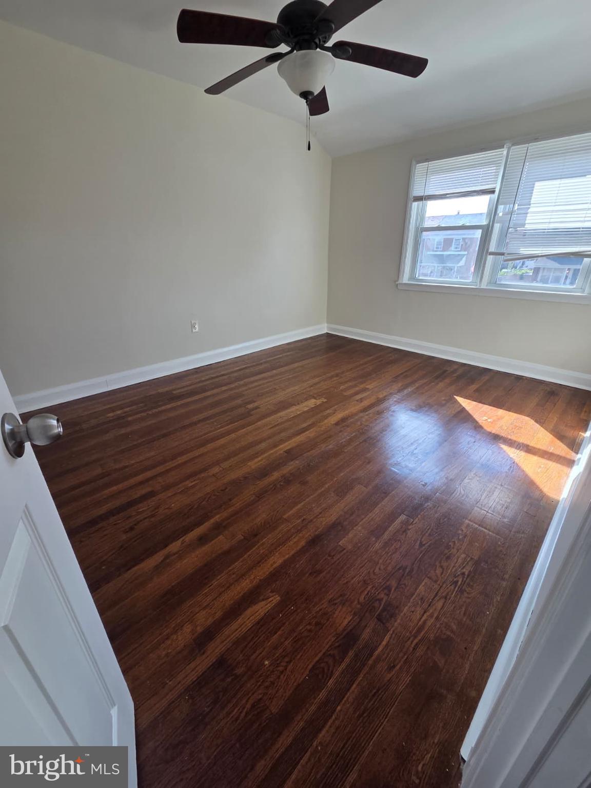 1930 Frames Road Dundalk, MD 21222 - Photo 22 of 30 en empty room with wooden floor
