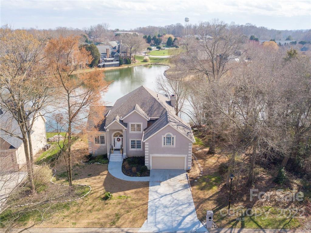 218 Chesterfield Canal Fort Mill, SC 29708 - Photo 1 of 40 a view of a house with a yard