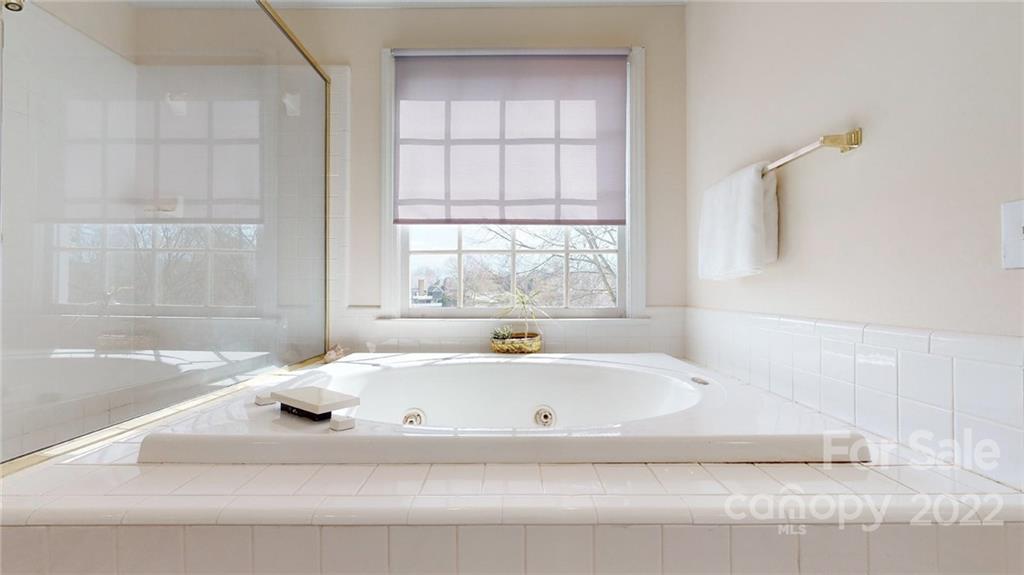 218 Chesterfield Canal Fort Mill, SC 29708 - Photo 22 of 40 a white bath tub sitting next to a window