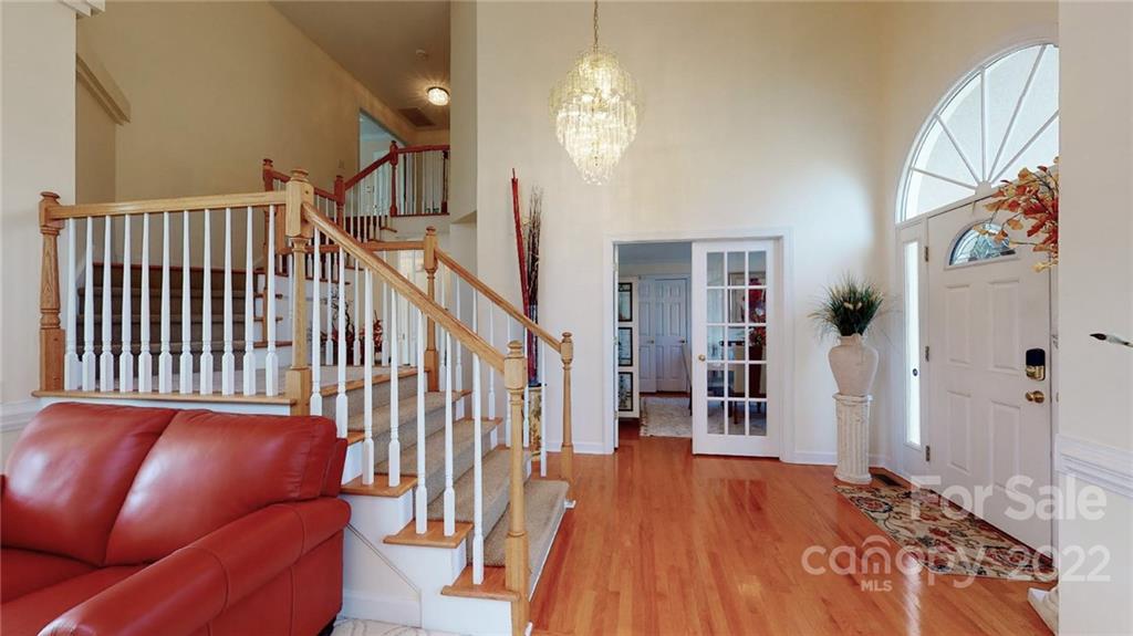 218 Chesterfield Canal Fort Mill, SC 29708 - Photo 4 of 40 a view of a livingroom with furniture and stairs