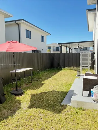 a view of a house with swimming pool