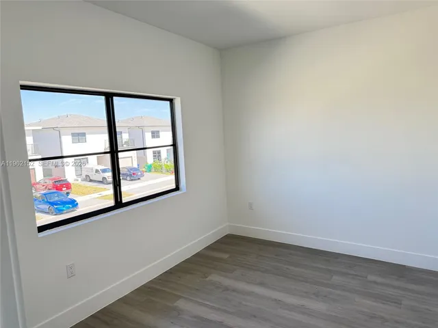 a view of an empty room with window