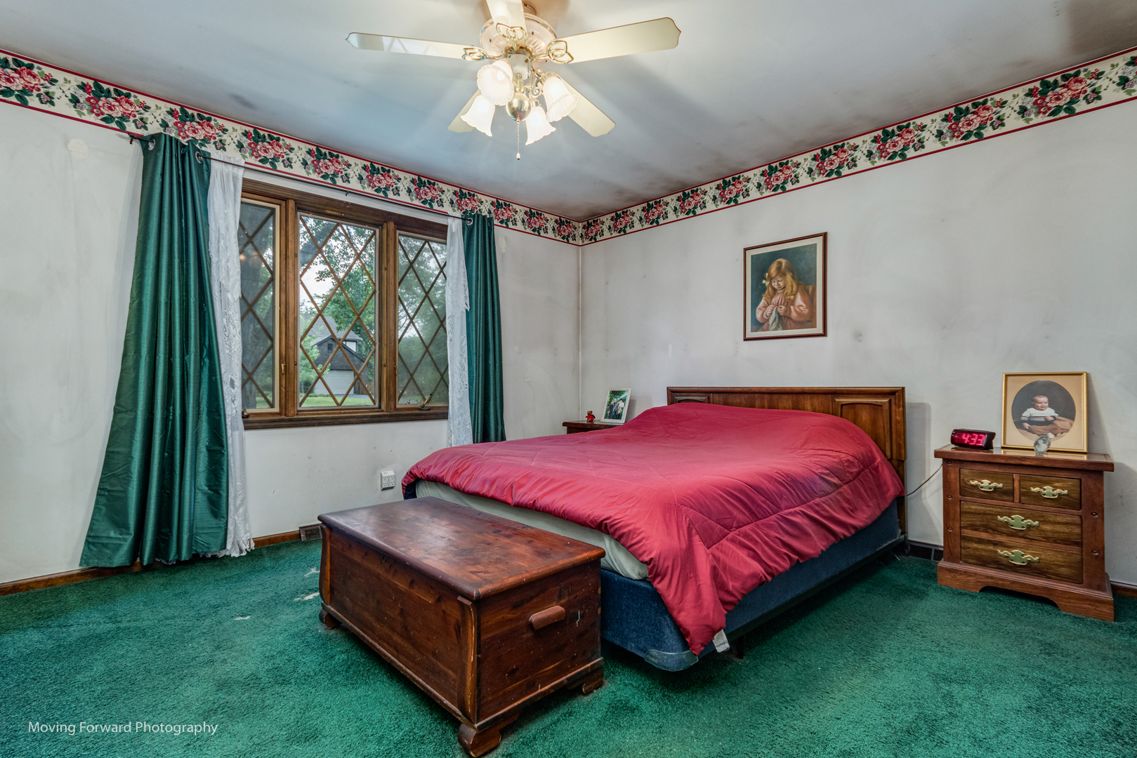 4 Cedar Gate Circle Sugar Grove, IL 60554 - Photo 12 of 34 a spacious bedroom with a bed and a chandelier