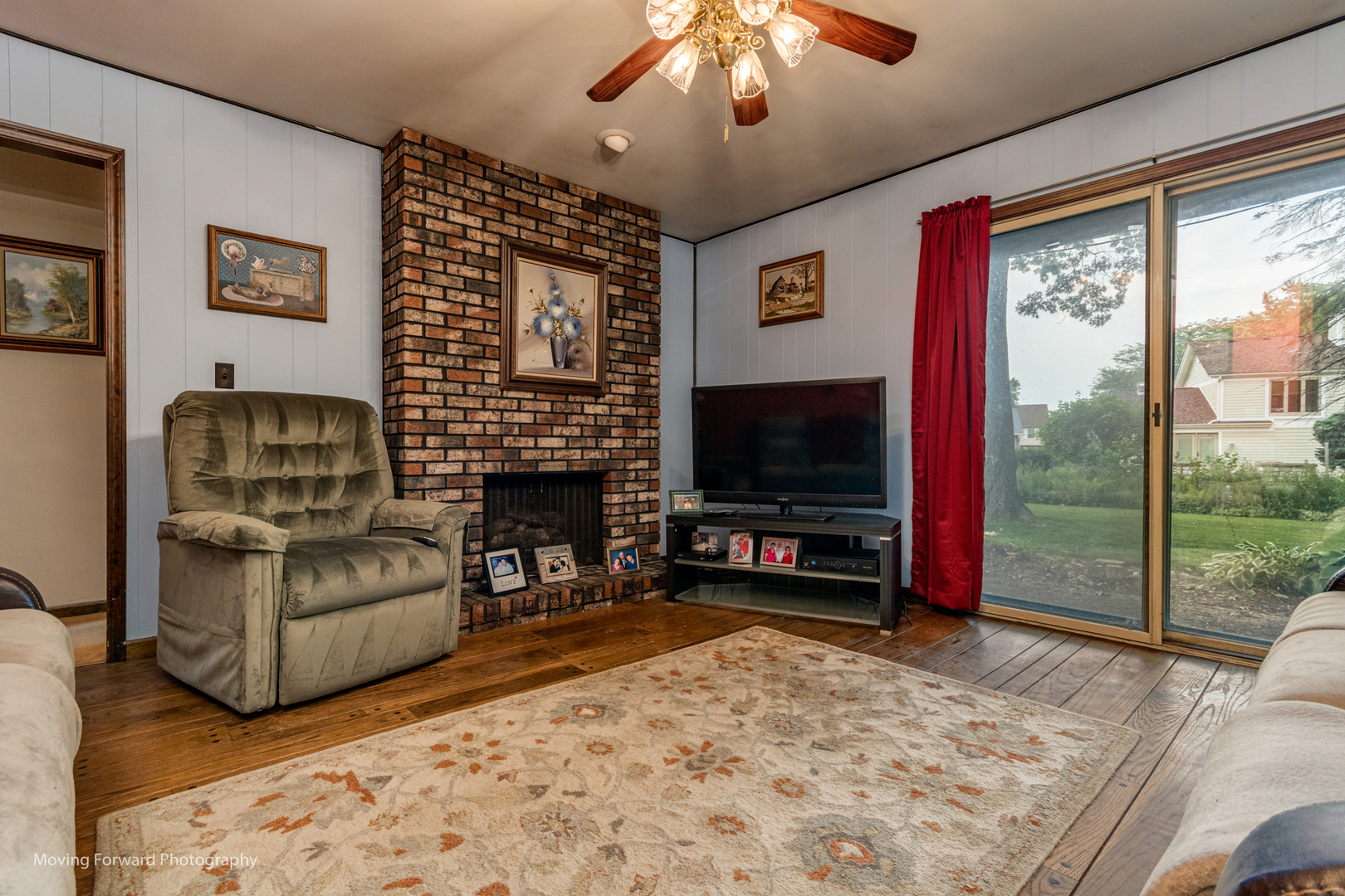 4 Cedar Gate Circle Sugar Grove, IL 60554 - Photo 5 of 34 a living room with furniture a flat screen tv and a fireplace