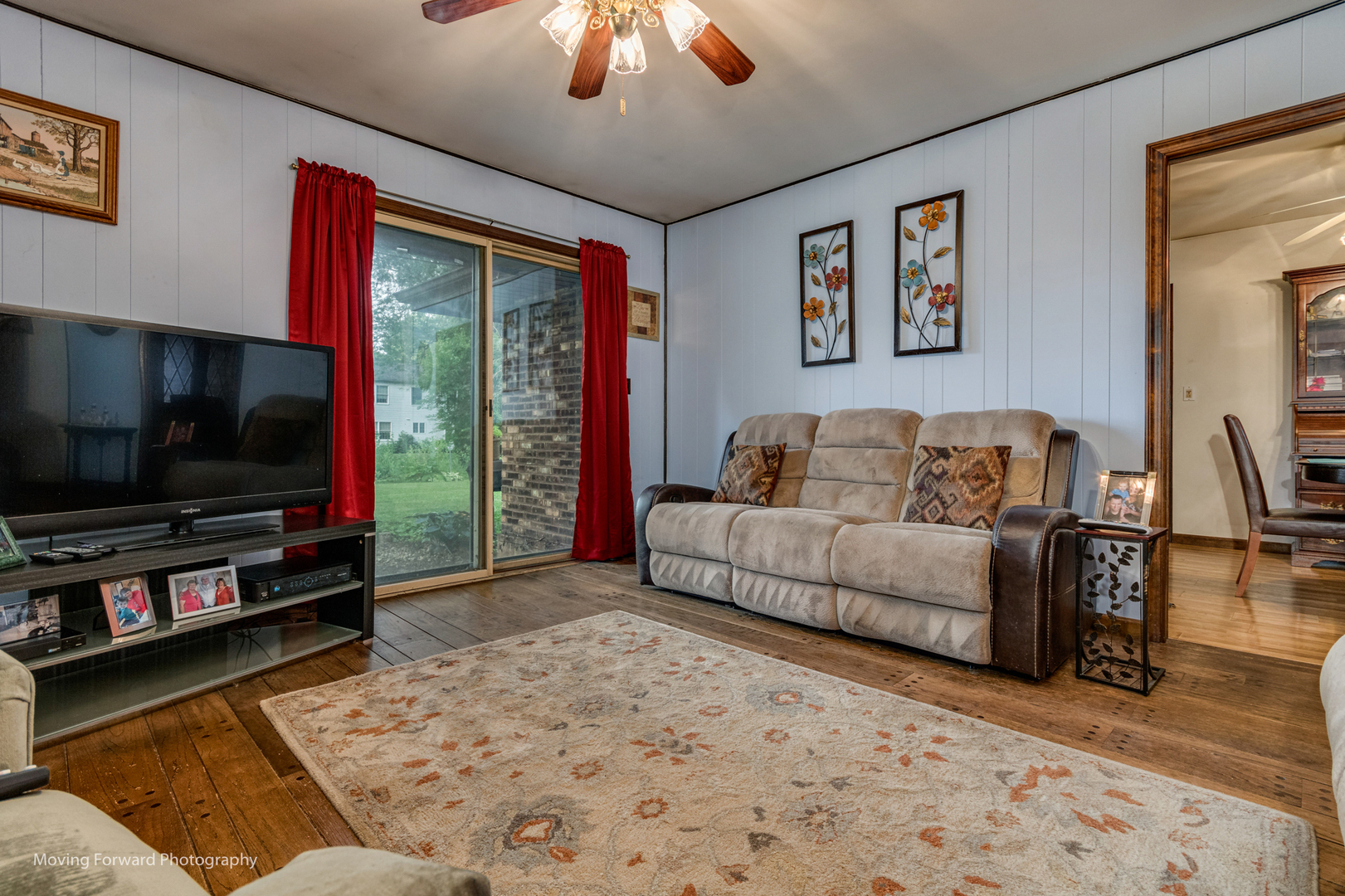 4 Cedar Gate Circle Sugar Grove, IL 60554 - Photo 6 of 34 a living room with furniture and a flat screen tv