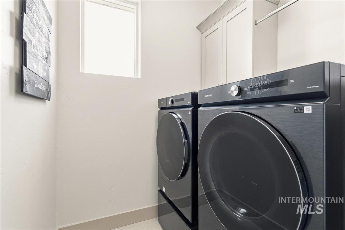 3794 South Single Tree Avenue Boise, ID 83716 - Photo 25 of 50 Dedicated laundry area featuring light-toned walls, a single window, and light-colored baseboard trim