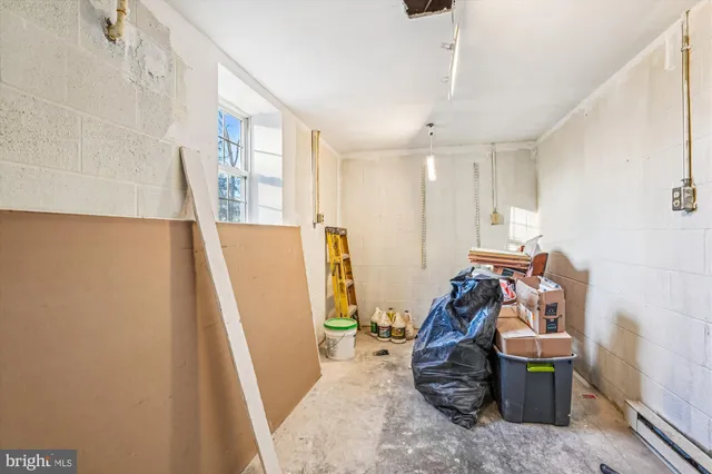 a view of room with toys and wooden floor
