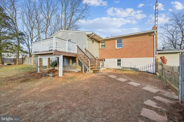 a view of a water fountain in front of house