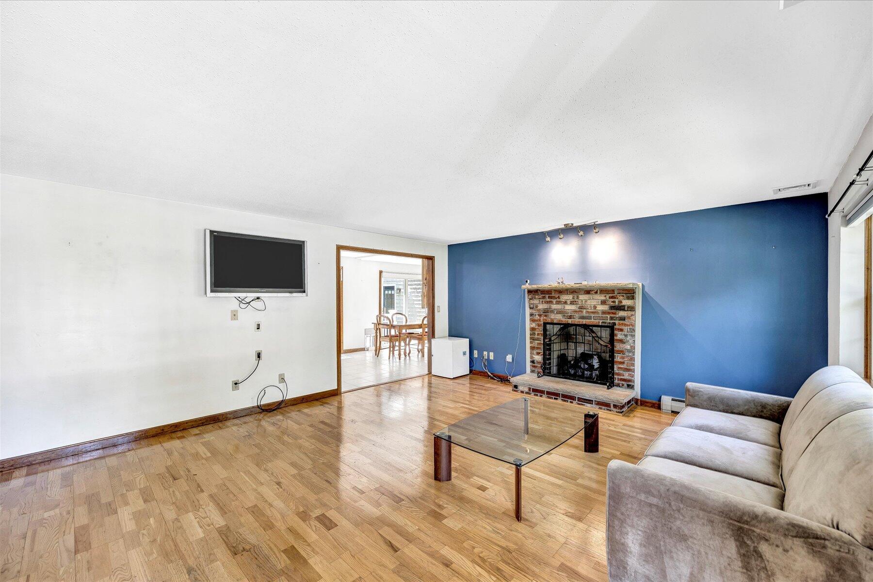 41 Ensign Road Centerville, MA 02632 - Photo 8 of 47 a living room with furniture and a flat screen tv