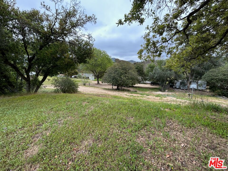 41322 De Luz Road Fallbrook, CA 92028 - Photo 19 of 29 a view of outdoor space with garden and trees