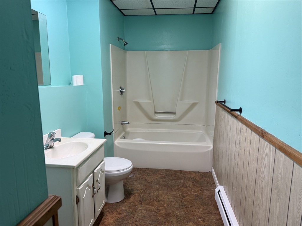 9 Lexington Street, Unit 1W Fall River, MA 02723 - Photo 6 of 10 a bathroom with a toilet a sink and bathtub