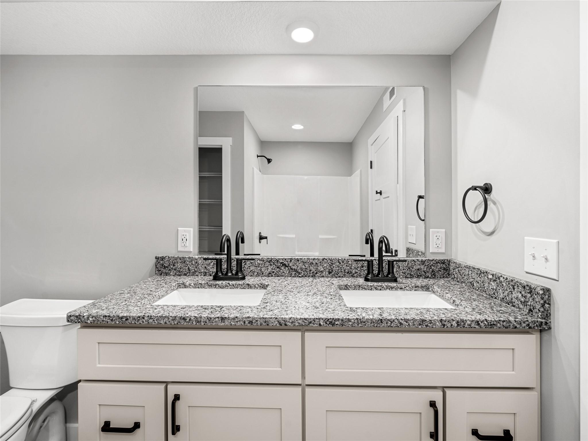 56 Trevor Trail Clyde, NC 28721 - Photo 13 of 27 a bathroom with sinks granite countertop a sink and a mirror