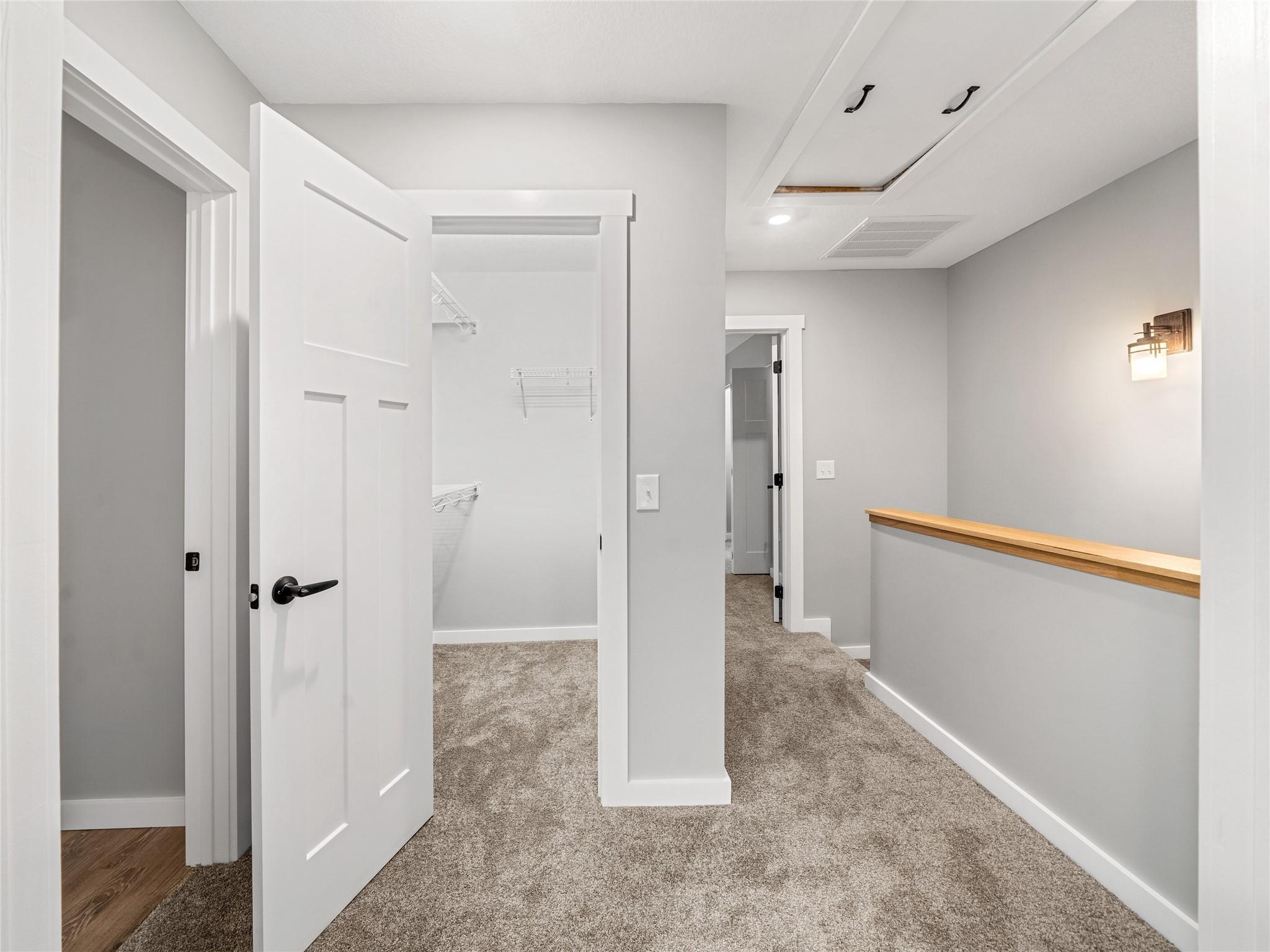 56 Trevor Trail Clyde, NC 28721 - Photo 19 of 27 a view of a hallway with wooden floor