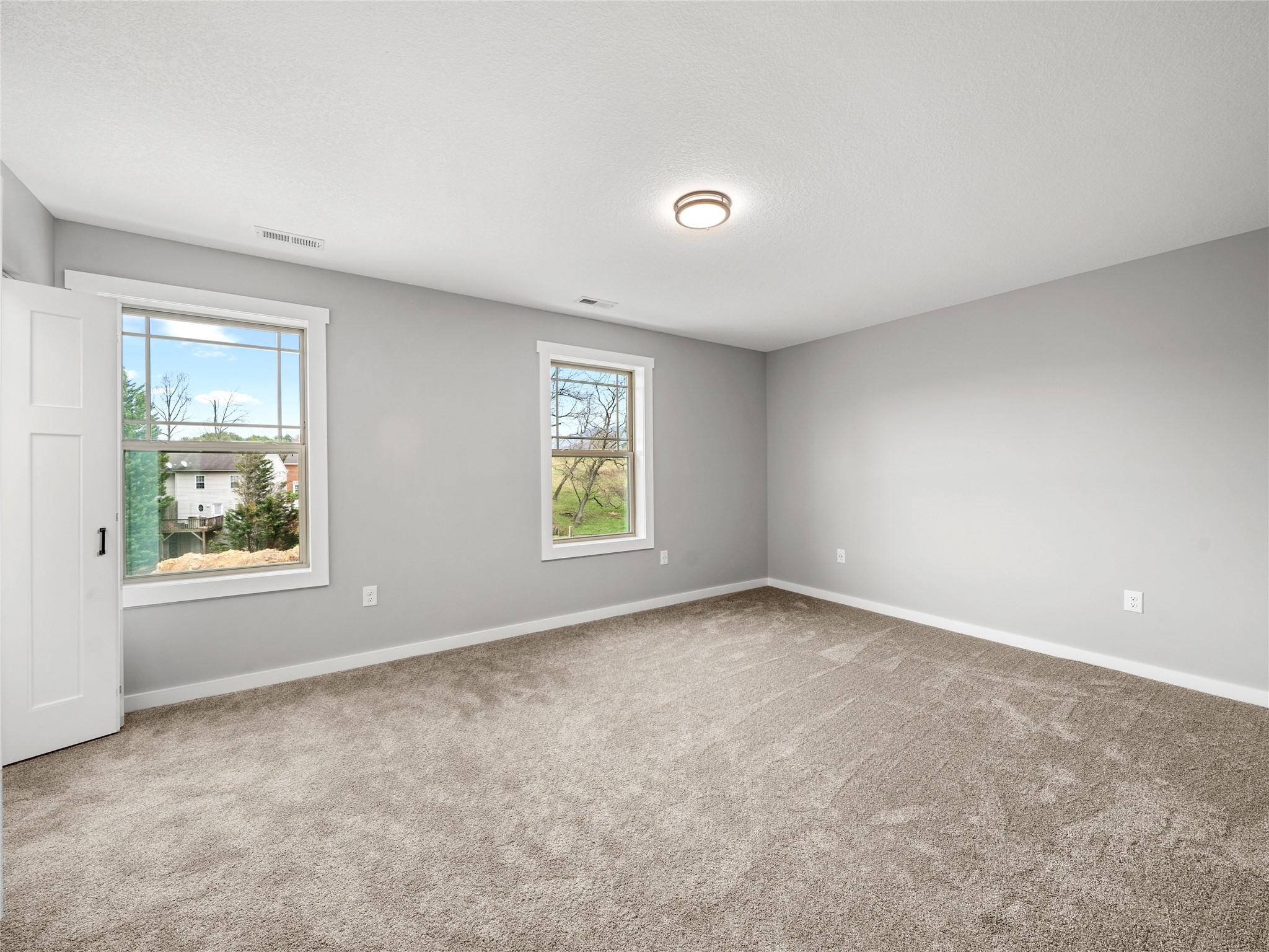 56 Trevor Trail Clyde, NC 28721 - Photo 20 of 27 an empty room with windows