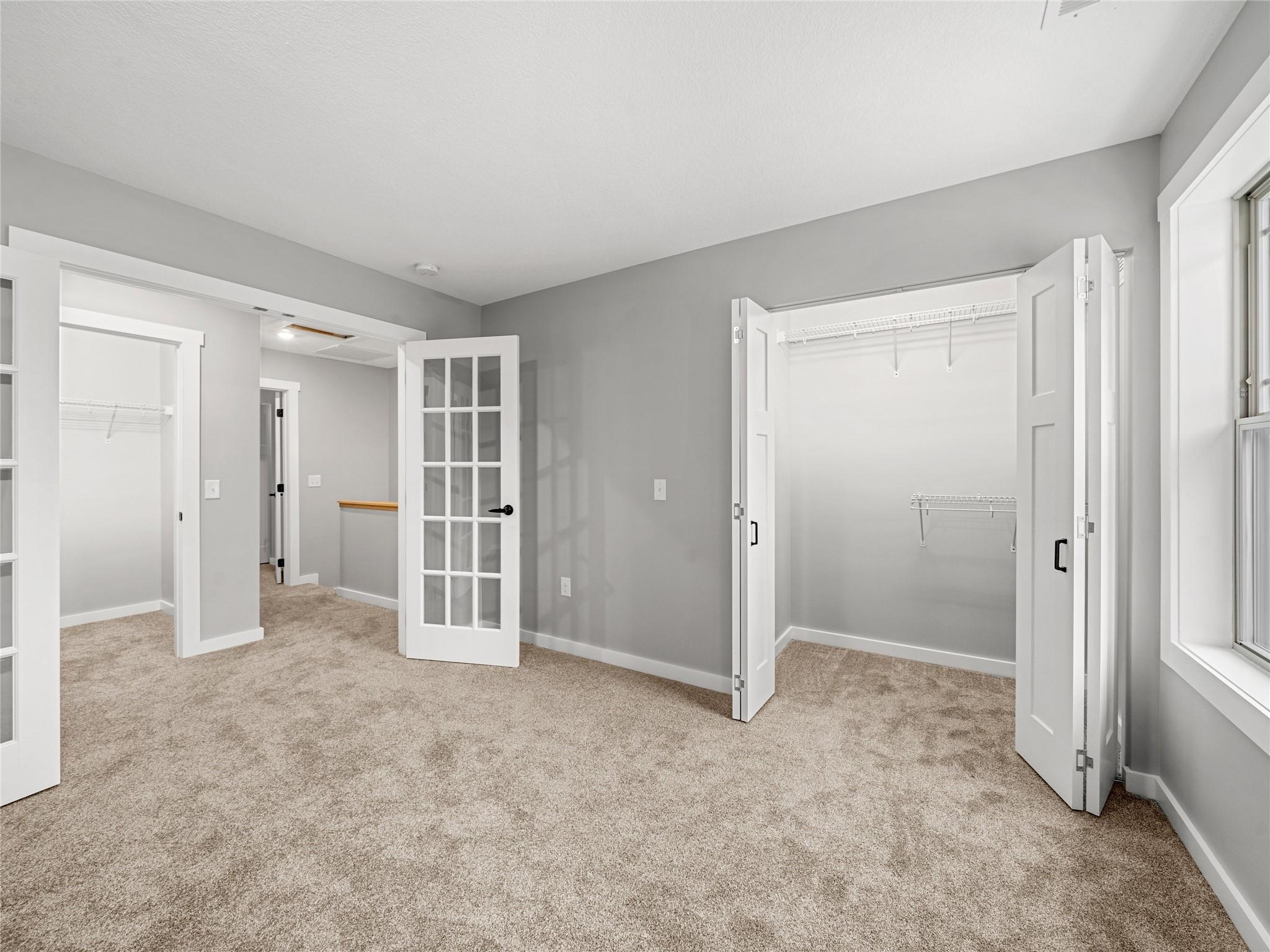 56 Trevor Trail Clyde, NC 28721 - Photo 21 of 27 an empty room with closet and a bathroom