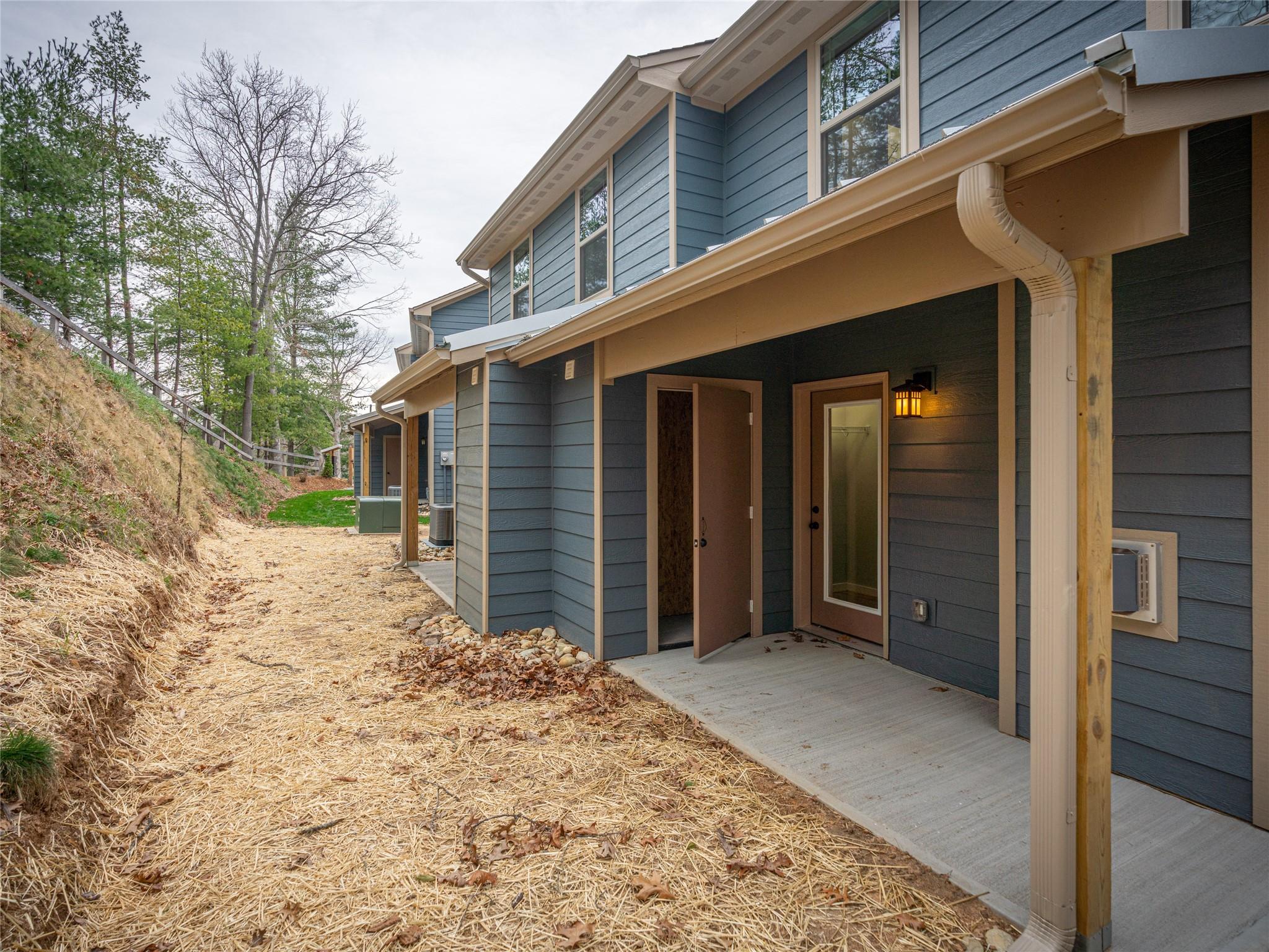 56 Trevor Trail Clyde, NC 28721 - Photo 23 of 27 a view of a house with a snow on the road