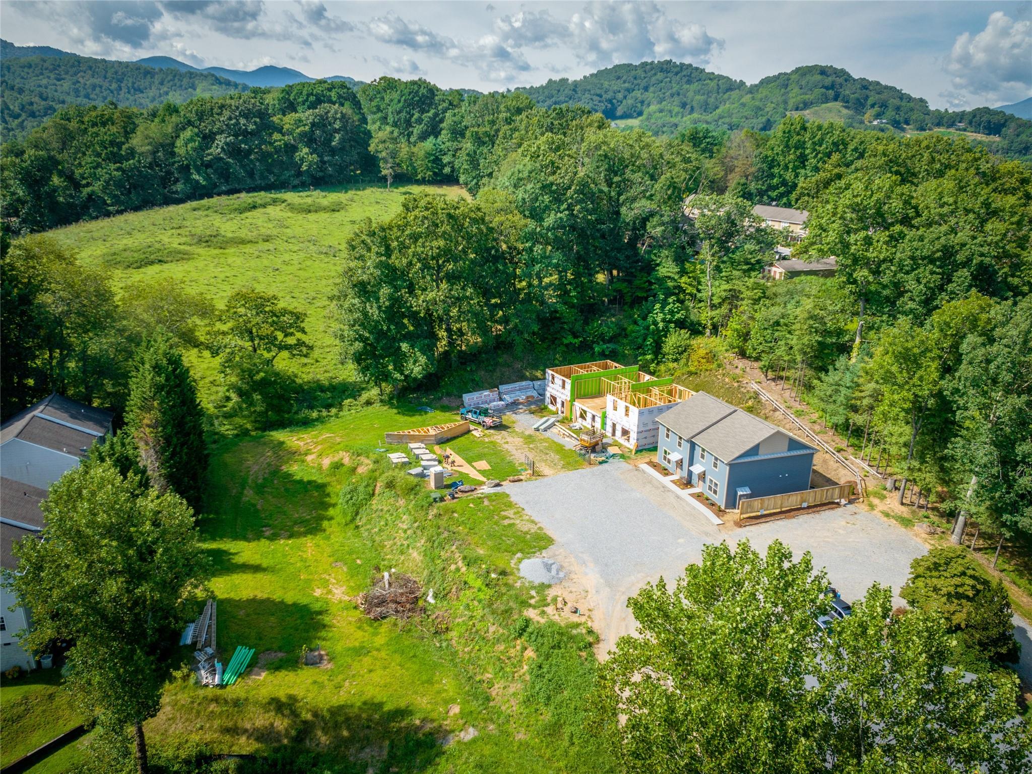 56 Trevor Trail Clyde, NC 28721 - Photo 27 of 27 an aerial view of a house with a yard