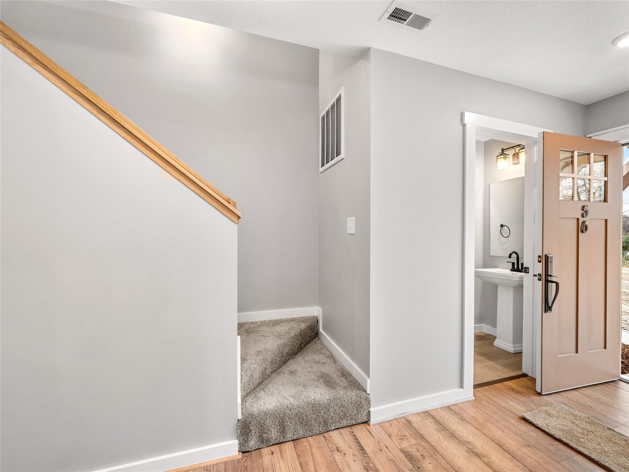 56 Trevor Trail Clyde, NC 28721 - Photo 7 of 27 a view of a hallway with wooden floor and entryway