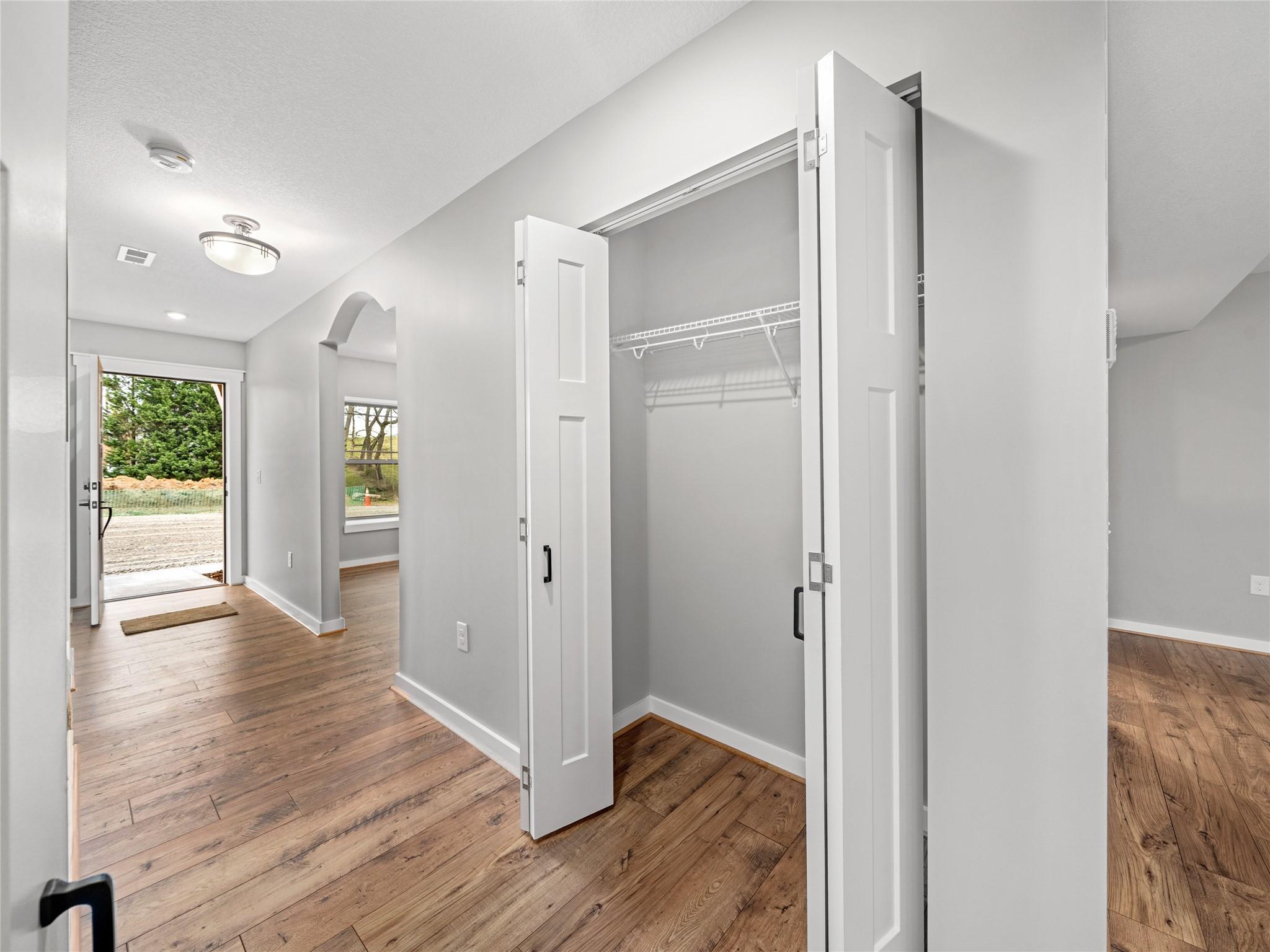 56 Trevor Trail Clyde, NC 28721 - Photo 9 of 27 a view of entryway with wooden floor