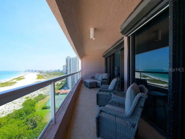 a balcony with furniture