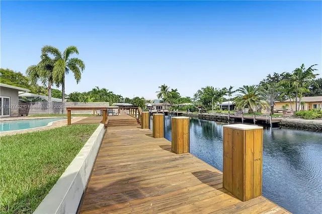 a view of a lake with a large trees