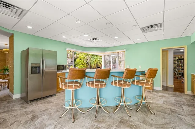 a living room with furniture and window