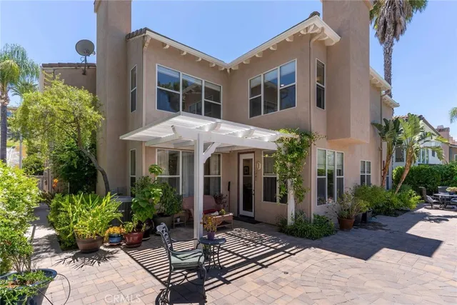 a view of table and chairs in patio