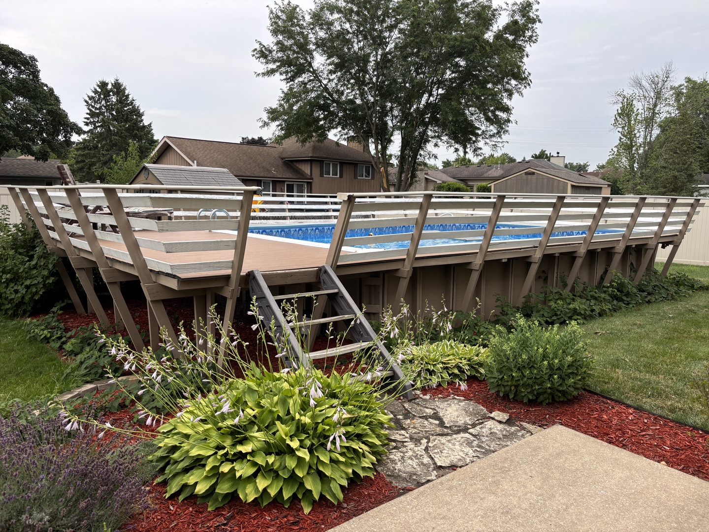 16529 Edgewood Road Plainfield, IL 60586 - Photo 19 of 24 a backyard of a house with table and chairs