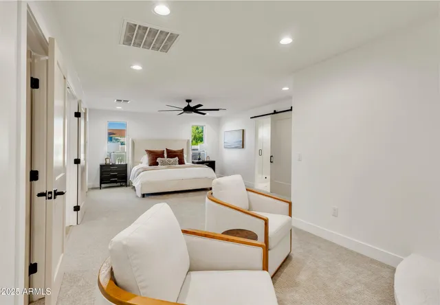 a view of livingroom with furniture and wooden floor