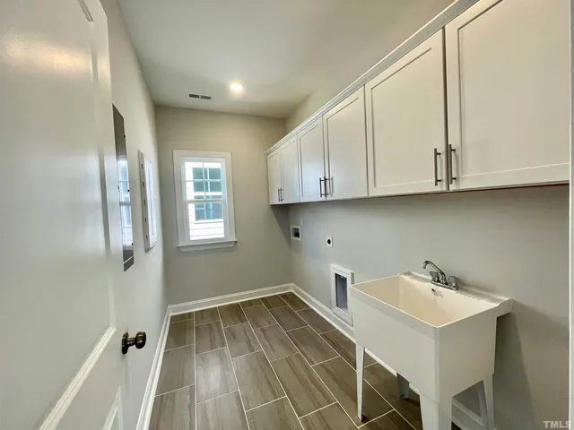 a view of a small space with racks on the wall