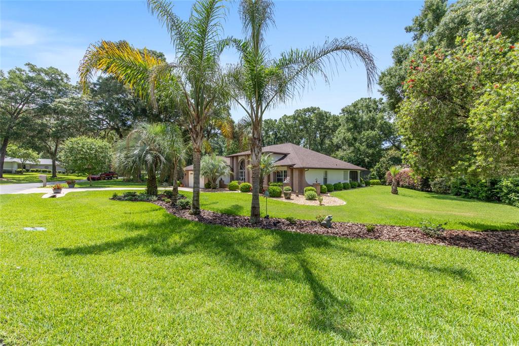 18825 Southwest 93rd Loop Dunnellon, FL 34432 - Photo 8 of 85 a view of a house with a big yard
