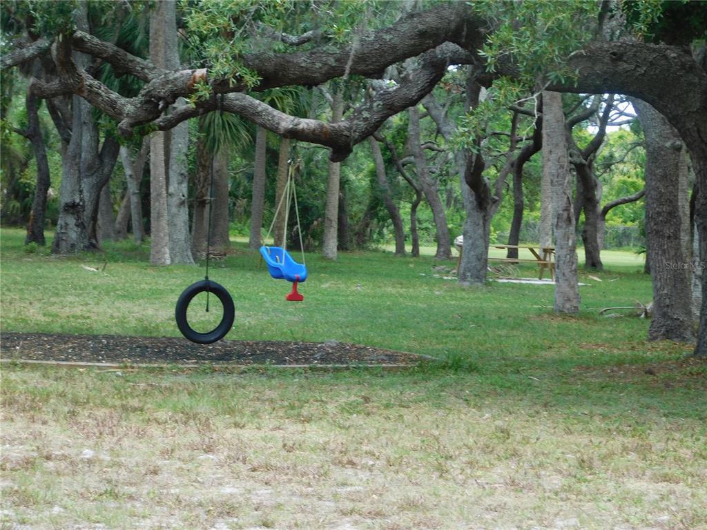 23 Lyle Circle Hudson, FL 34667 - Photo 8 of 14 a view of outdoor space with garden