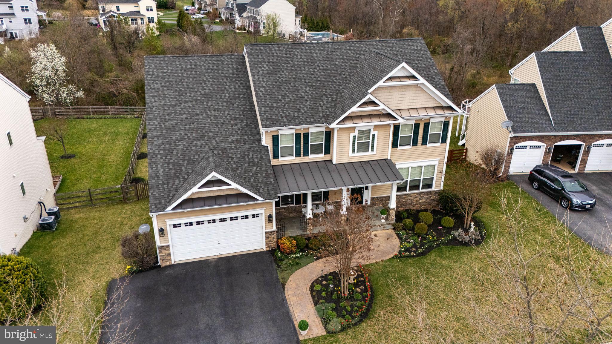 18004 Bliss Drive Poolesville, MD 20837 - Photo 2 of 57 an aerial view of a house with a yard