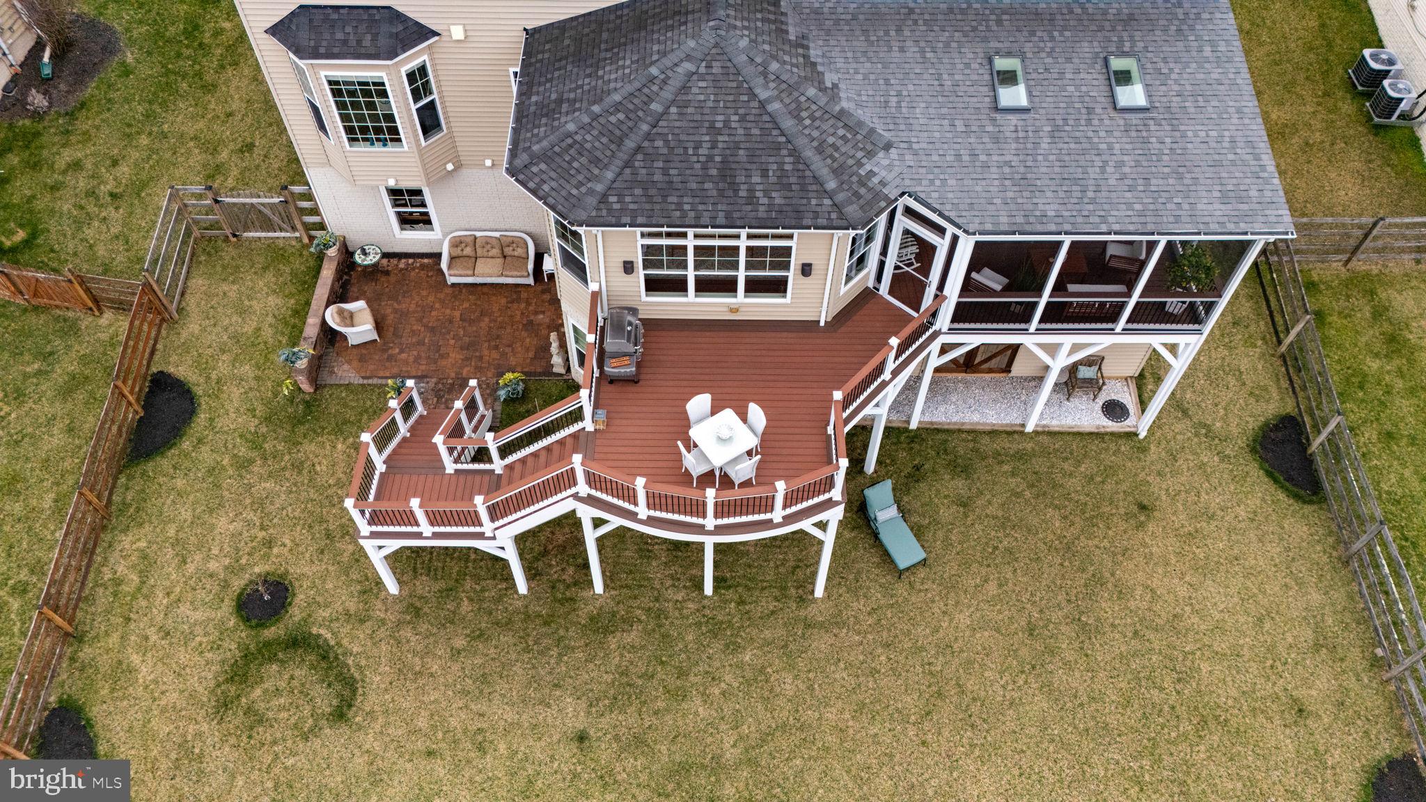 18004 Bliss Drive Poolesville, MD 20837 - Photo 49 of 57 an aerial view of a house with table and chairs
