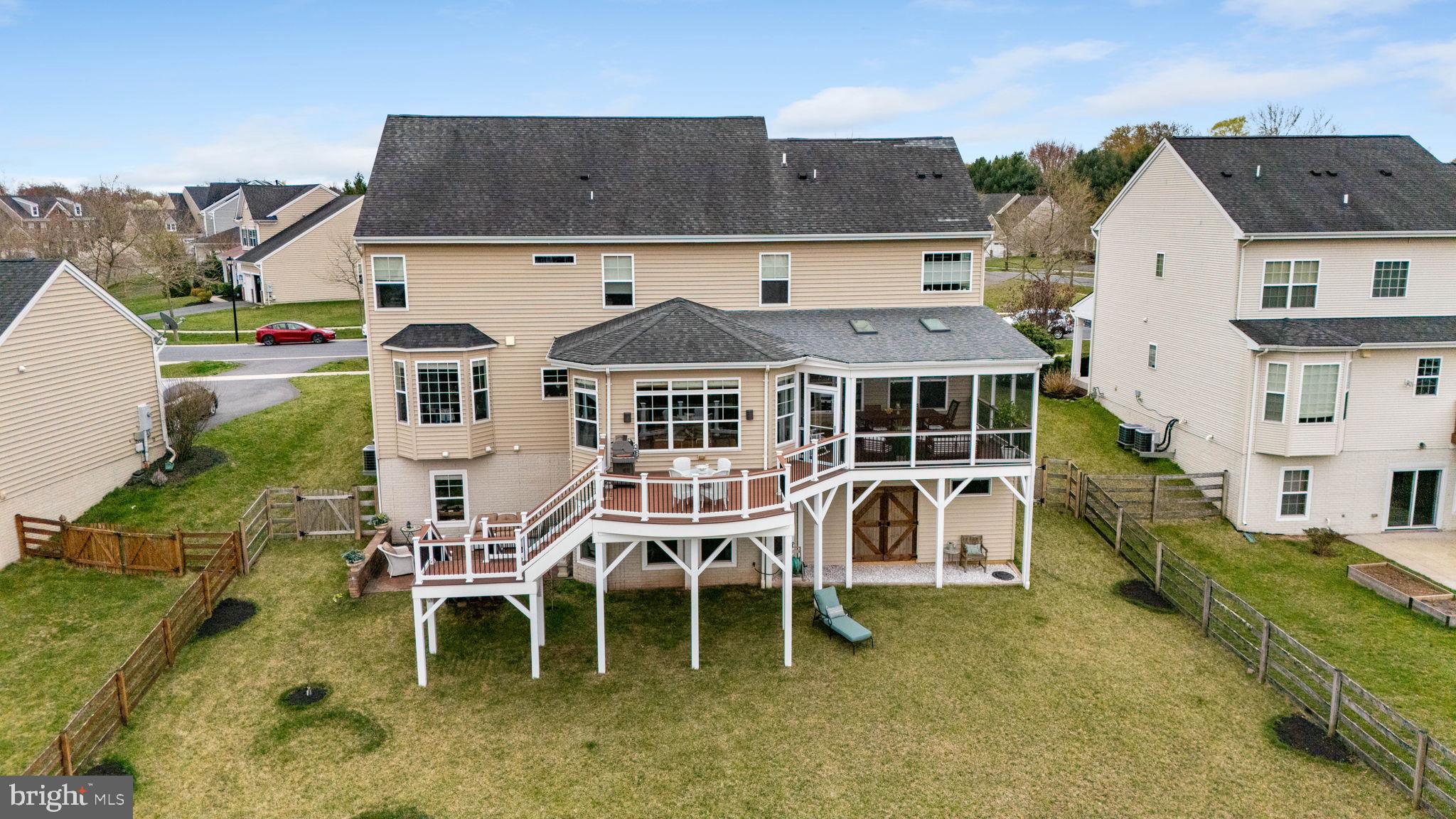18004 Bliss Drive Poolesville, MD 20837 - Photo 50 of 57 a view of a house with a yard