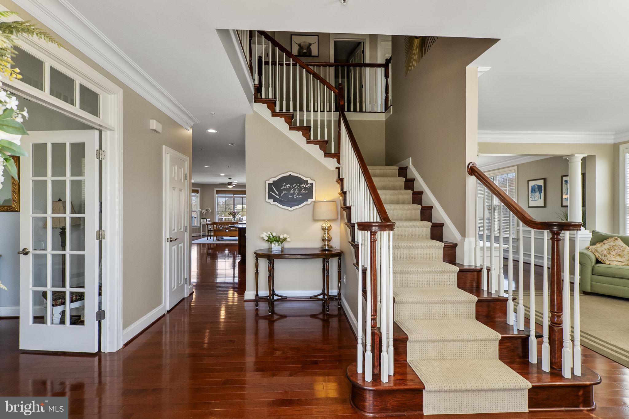 18004 Bliss Drive Poolesville, MD 20837 - Photo 5 of 57 a view of entryway and hall with wooden floor