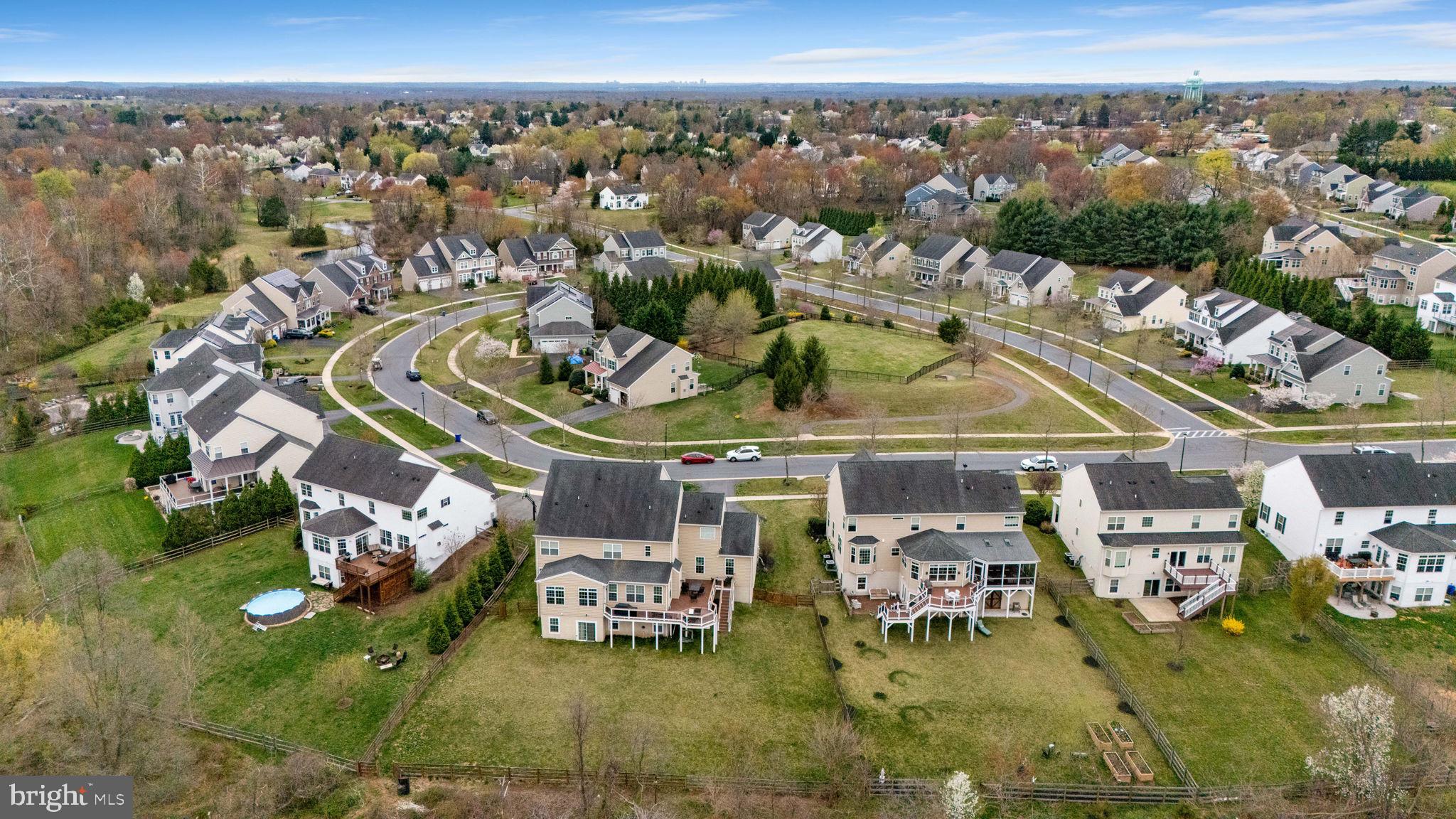 18004 Bliss Drive Poolesville, MD 20837 - Photo 53 of 57 an aerial view of a house with a big yard