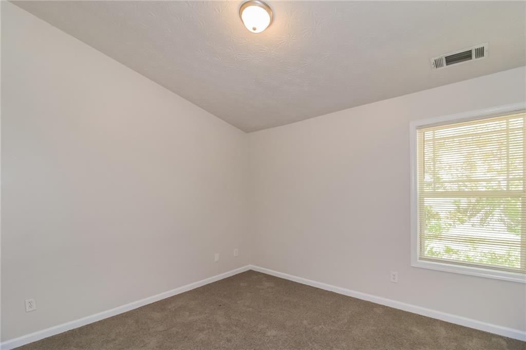 3824 Augustine Place Rex, GA 30273 - Photo 16 of 24 an empty room with a window