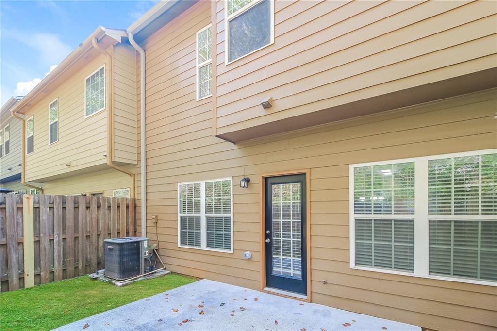 3824 Augustine Place Rex, GA 30273 - Photo 23 of 24 a front view of a house with a garden