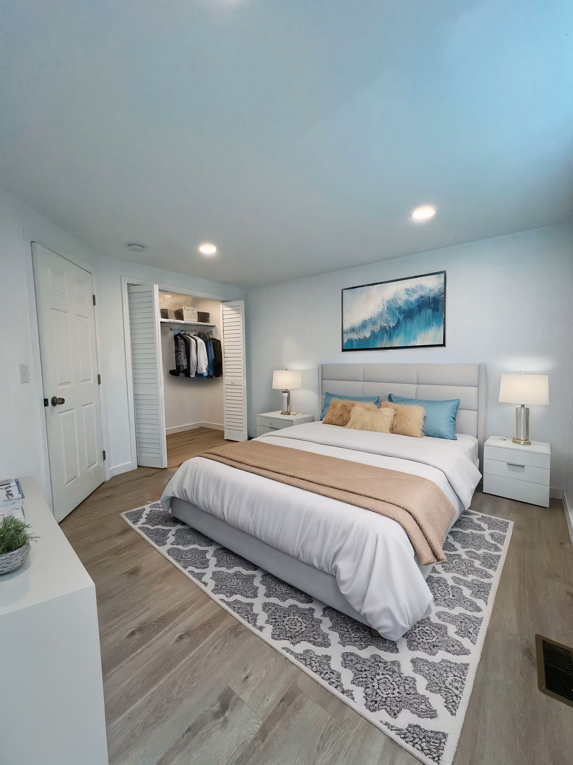 224 Cherry Street Madison, TN 37115 - Photo 5 of 11 a spacious bedroom with a bed and a couch