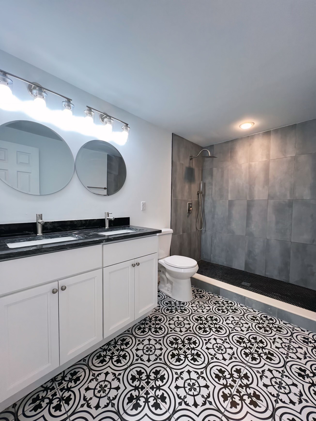 224 Cherry Street Madison, TN 37115 - Photo 7 of 11 a bathroom with a sink a toilet and a mirror