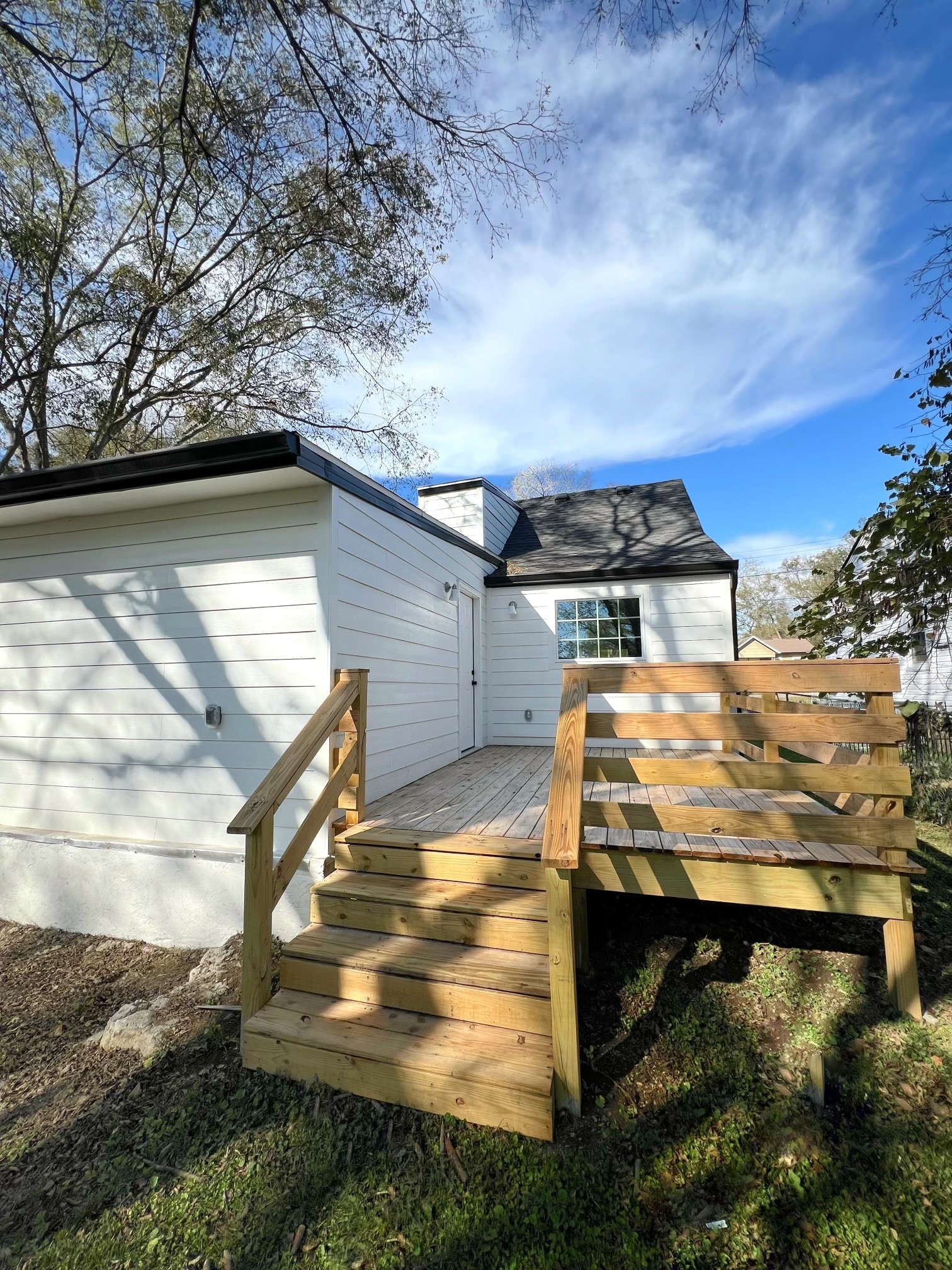 224 Cherry Street Madison, TN 37115 - Photo 10 of 11 a view of a balcony with wooden floor and city view