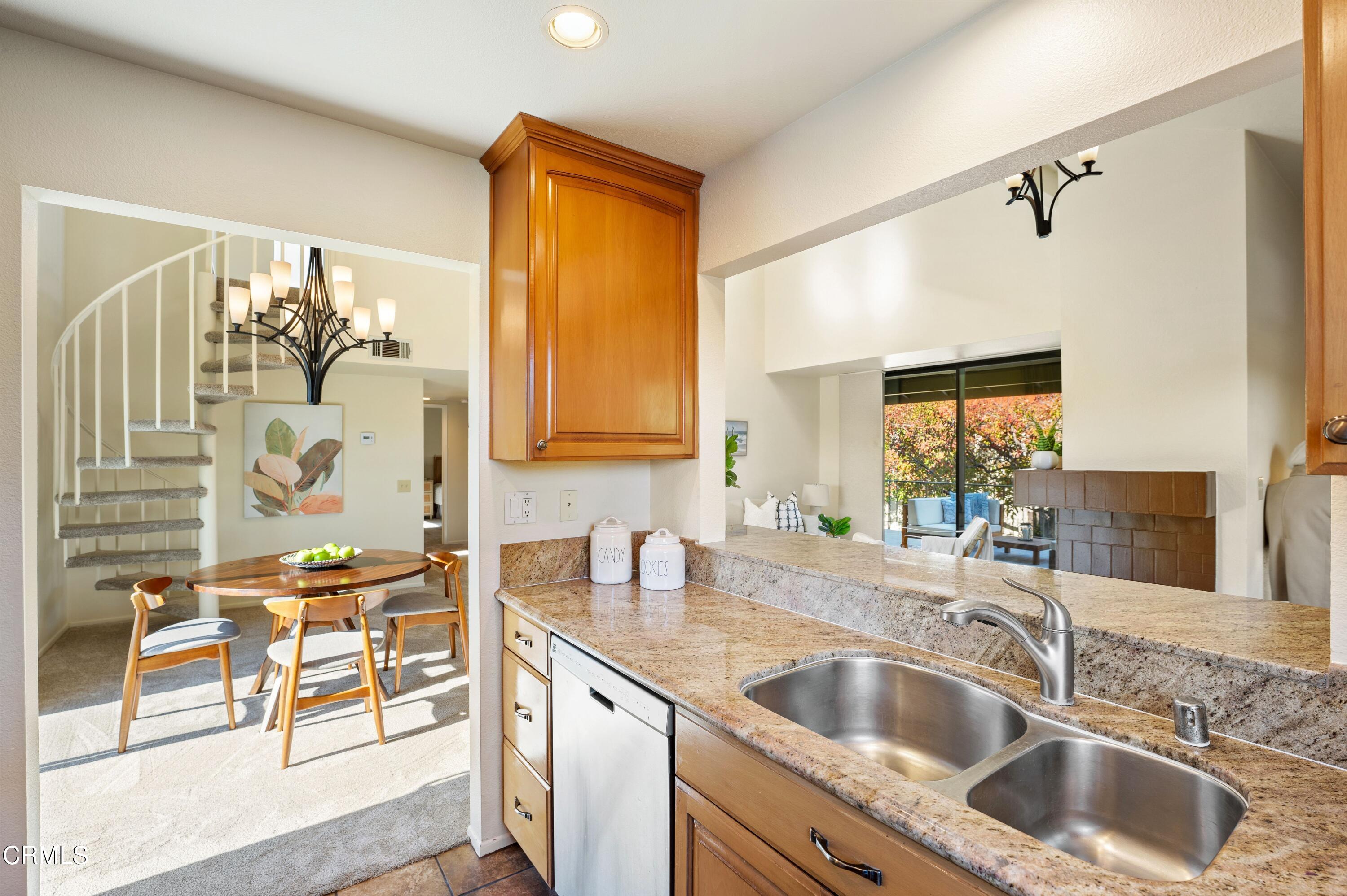 2041 Majorca Drive Oxnard, CA 93035 - Photo 13 of 31 a kitchen with a sink and a refrigerator