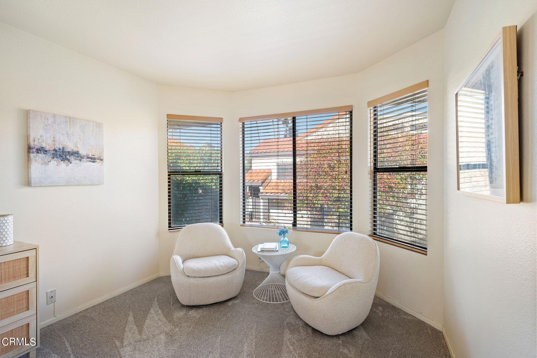 2041 Majorca Drive Oxnard, CA 93035 - Photo 16 of 31 a living room with furniture and a large window