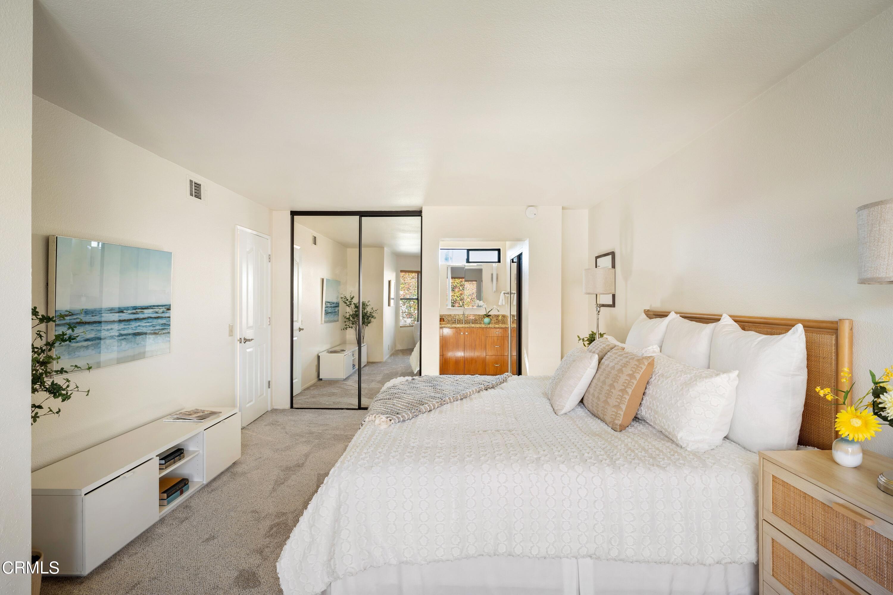 2041 Majorca Drive Oxnard, CA 93035 - Photo 17 of 31 a spacious bedroom with a bed and a cabinets